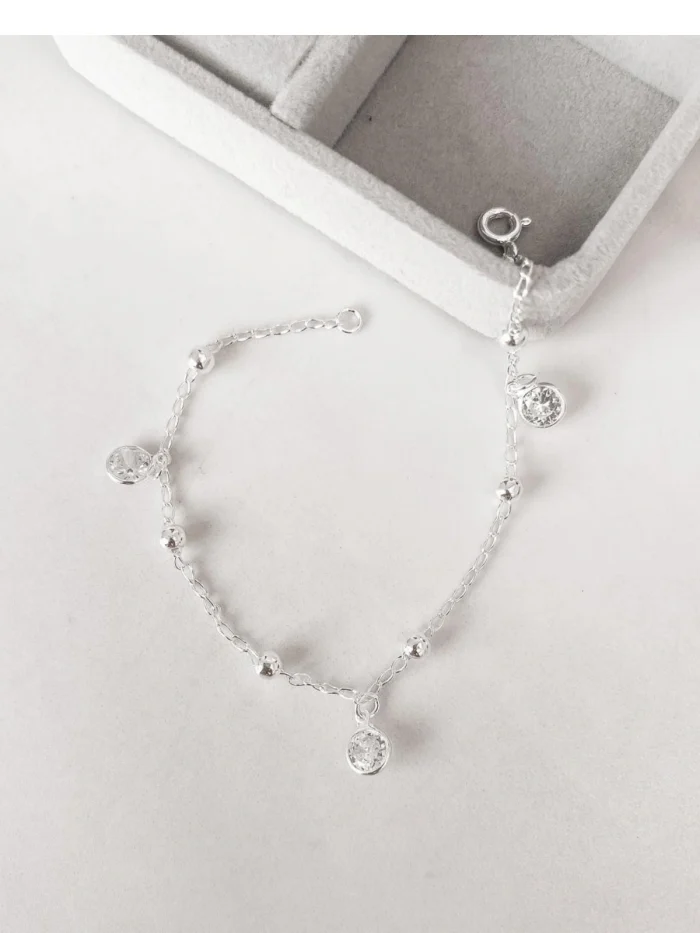 Pulseira bolinhas e 3 brilhantes